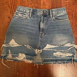 FRAME distressed jean skirt.